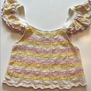 Knit top with ruffled sleeves